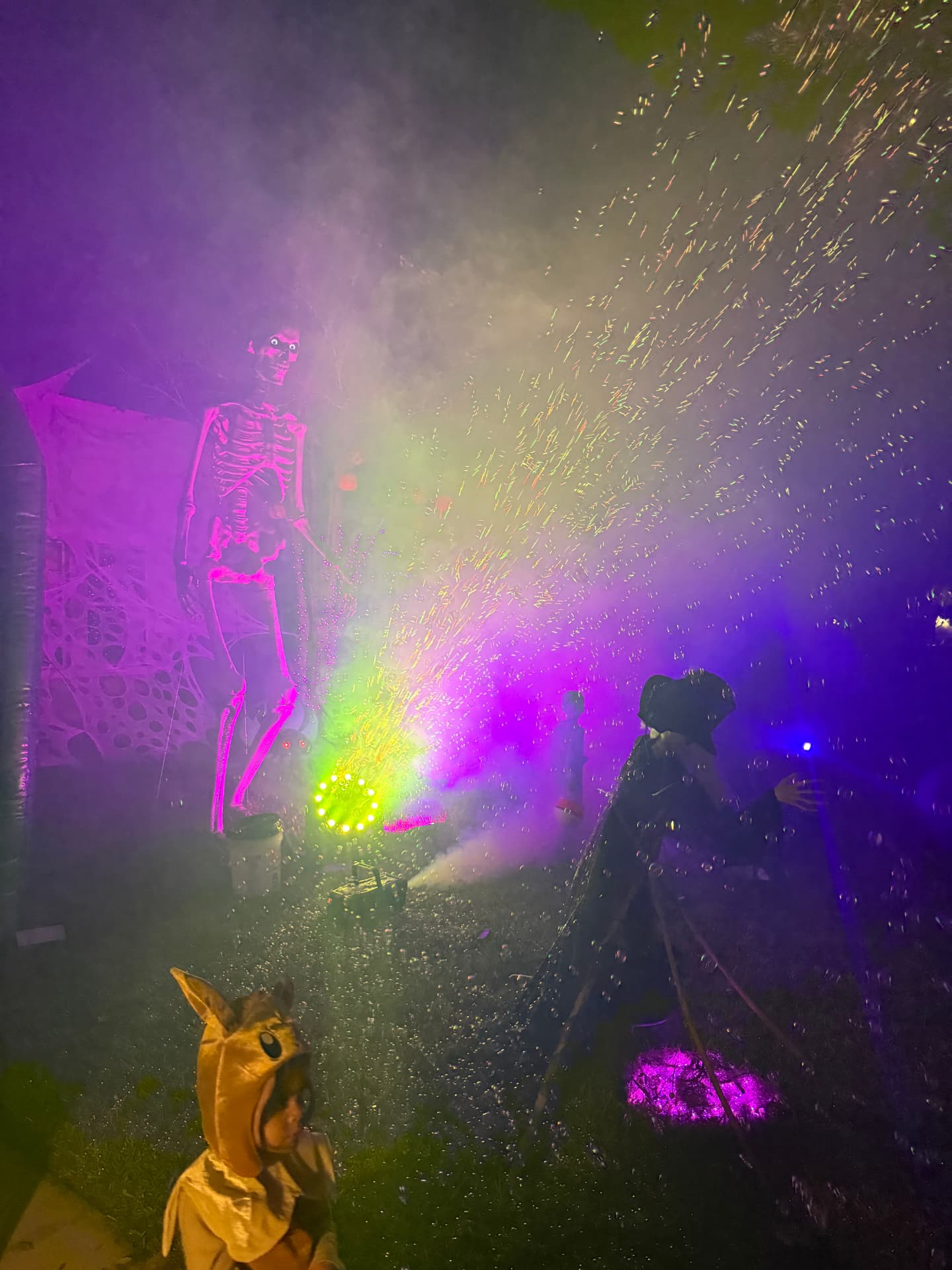 Neon bubble party at night with colorful lighting