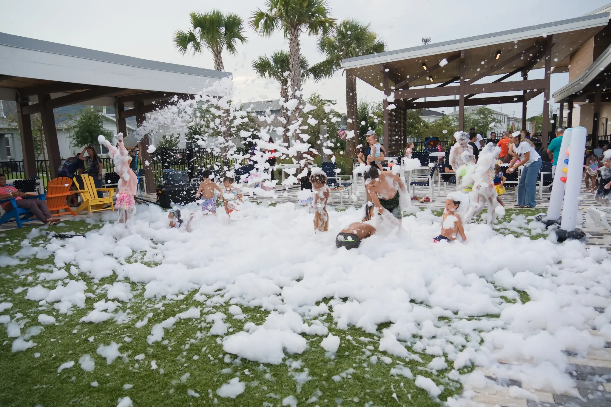 Foam covering a residential backyard during a party
