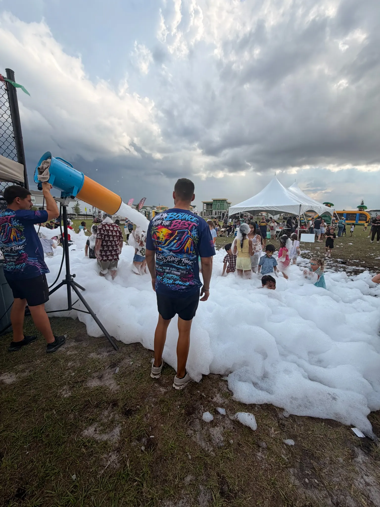 FoamHype crew running a foam cannon at a large public community event